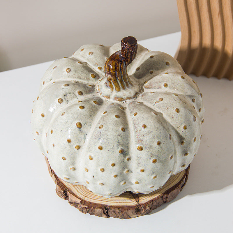A ceramic pumpkin ornament