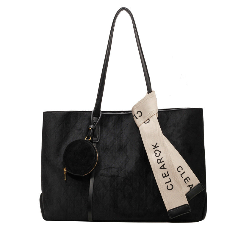 A frosted leather shoulder bag