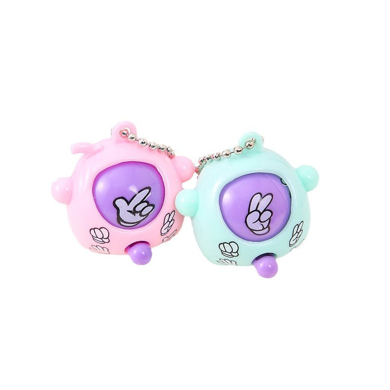 A guessing egg keychain scissors stone cloth face twisting egg
