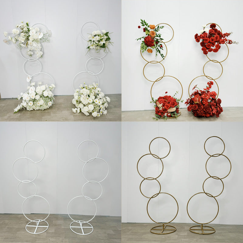 A wrought iron flower stand road guide