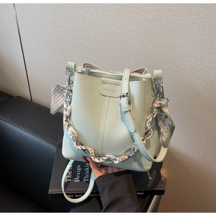 A handbag shoulder messenger bag