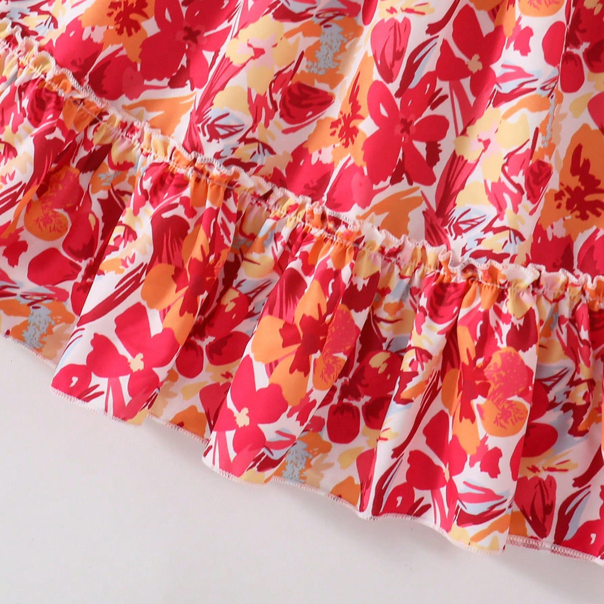 A floral full print lotus leaf edge suspender skirt short short sleeve top girls two-piece set