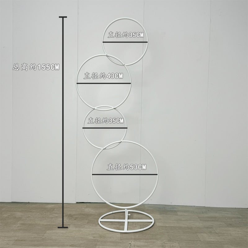 A wrought iron flower stand road guide