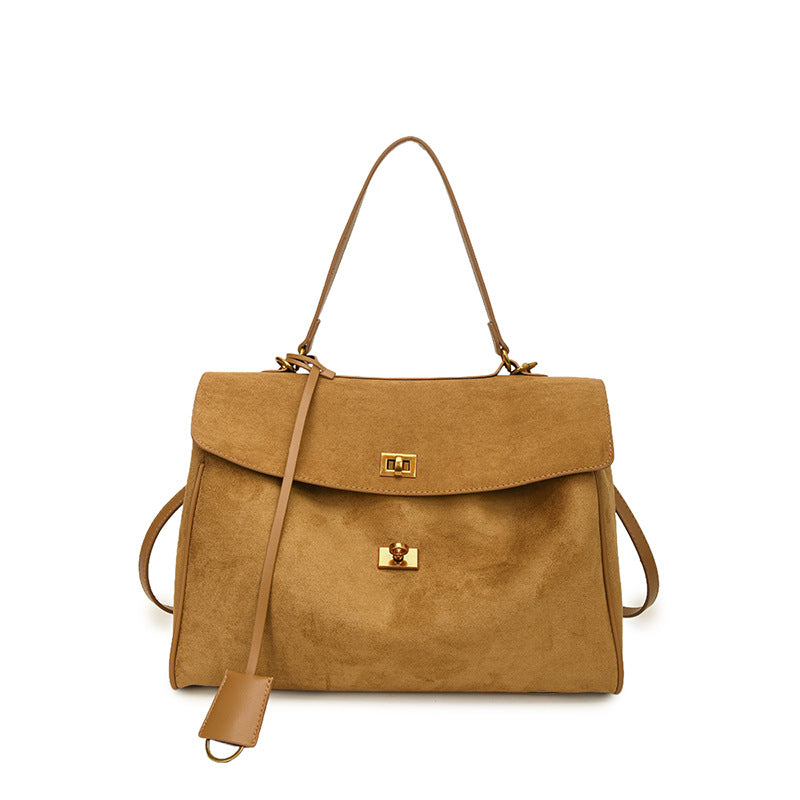 A suede shoulder bag