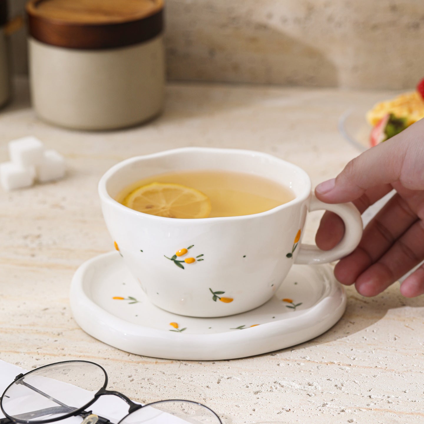 A Embossed Ceramic Coffee Cup and Saucer Set