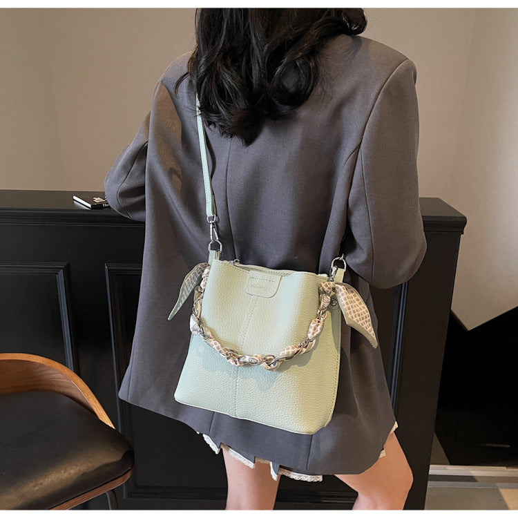 A handbag shoulder messenger bag