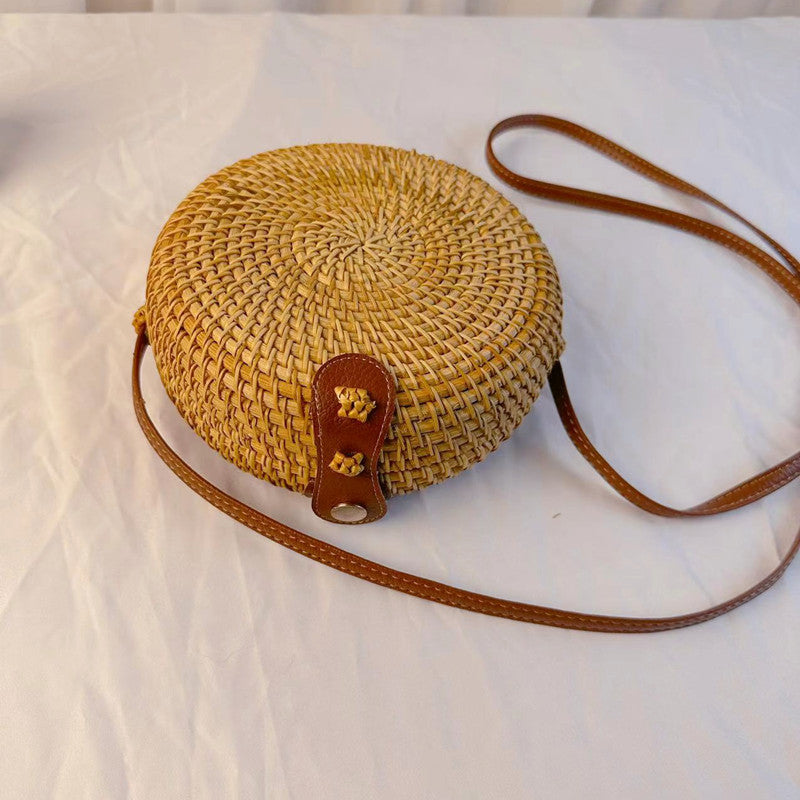 A rattan bag ins diagonal span mini bag Mori basket retro literary woven round bag vacation bucket bag leather buckle bag