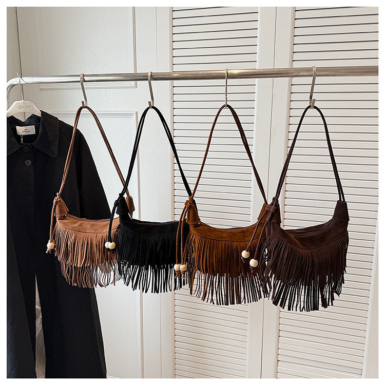 A fringed shoulder bag