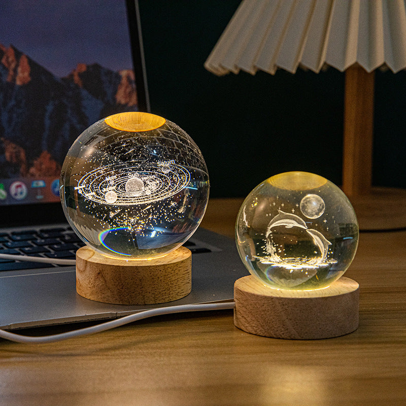 A creative 3d laser engraved crystal ball lamp