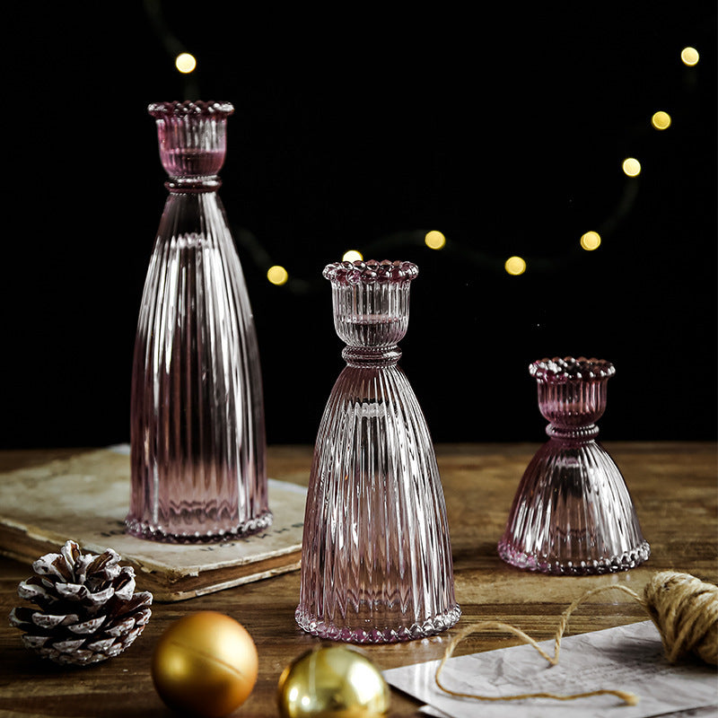 A glass candlestick ornament