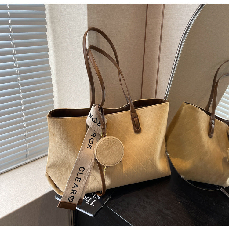 A frosted leather shoulder bag