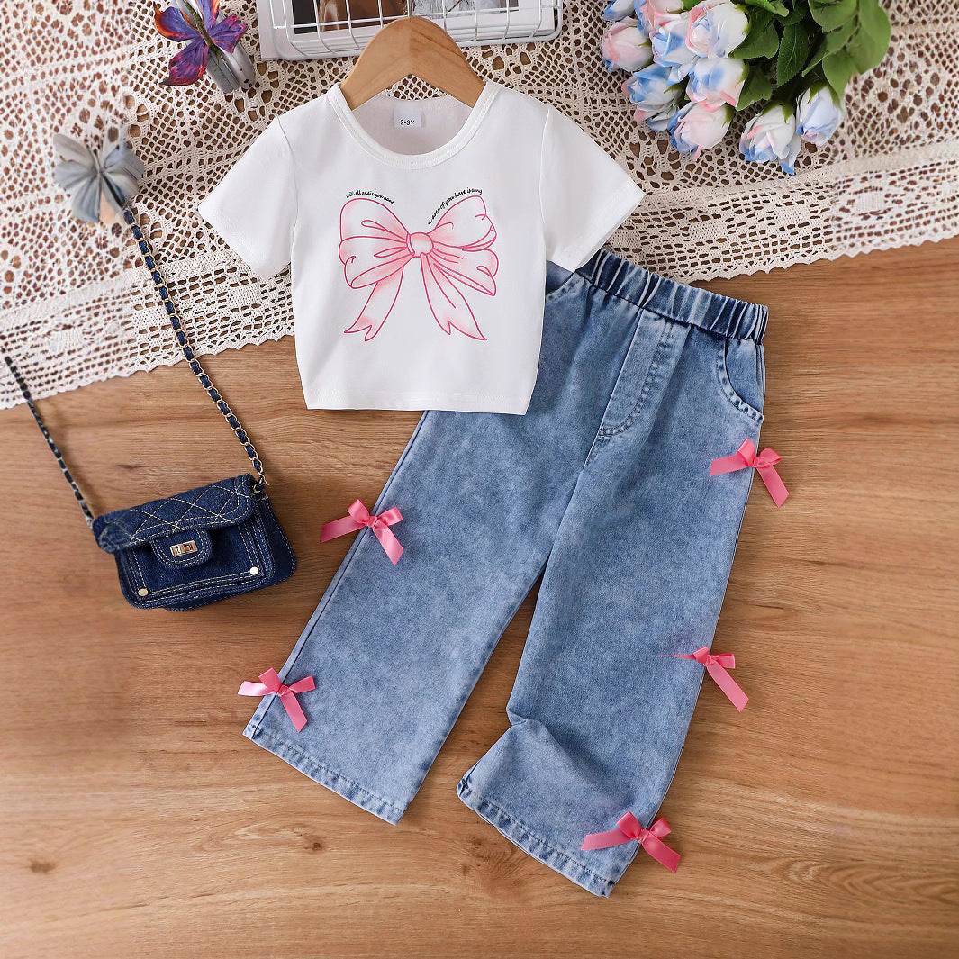 A girls' round neck bow printed short-sleeved T-shirt + straight loose jeans two-piece set