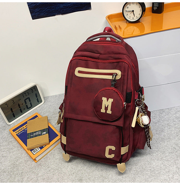 A Korean version ins new high-value solid color alphabet backpack couple casual simple lightweight large-capacity backpack