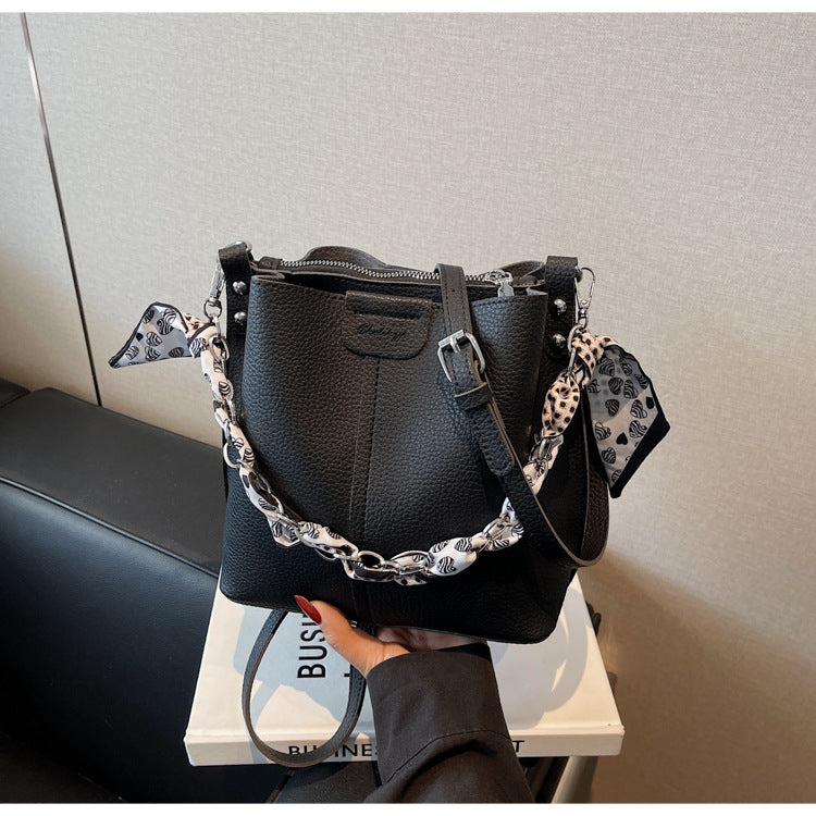 A handbag shoulder messenger bag