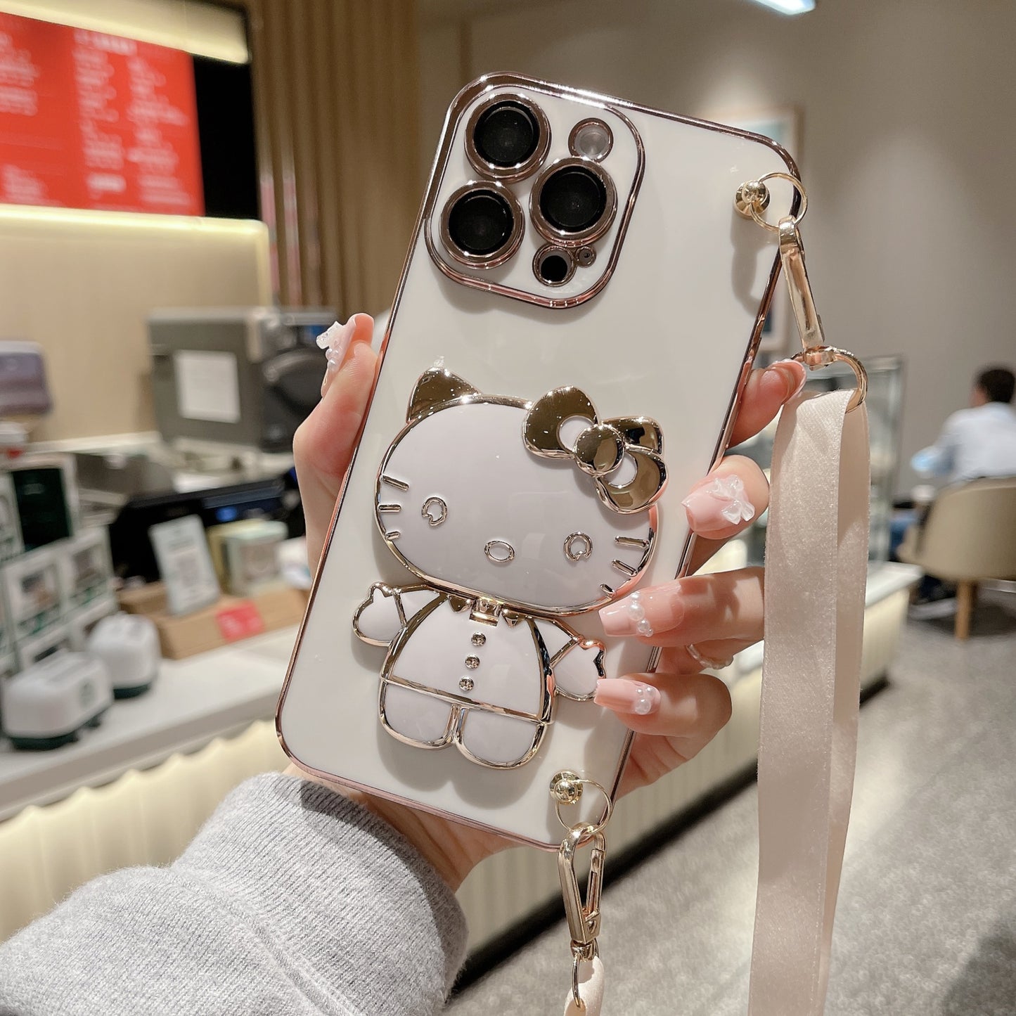 A makeup mirror crossbody rope mobile phone case