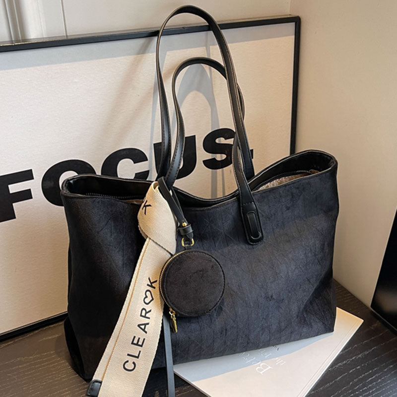 A frosted leather shoulder bag
