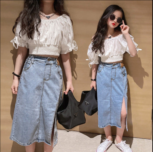 A new summer girls fashionable suit children's Internet celebrity big children's foreign style off-the-shoulder doll shirt + denim skirt