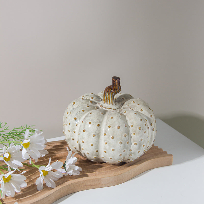 A ceramic pumpkin ornament