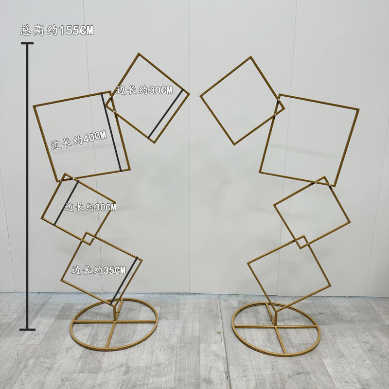 A wrought iron flower stand road guide