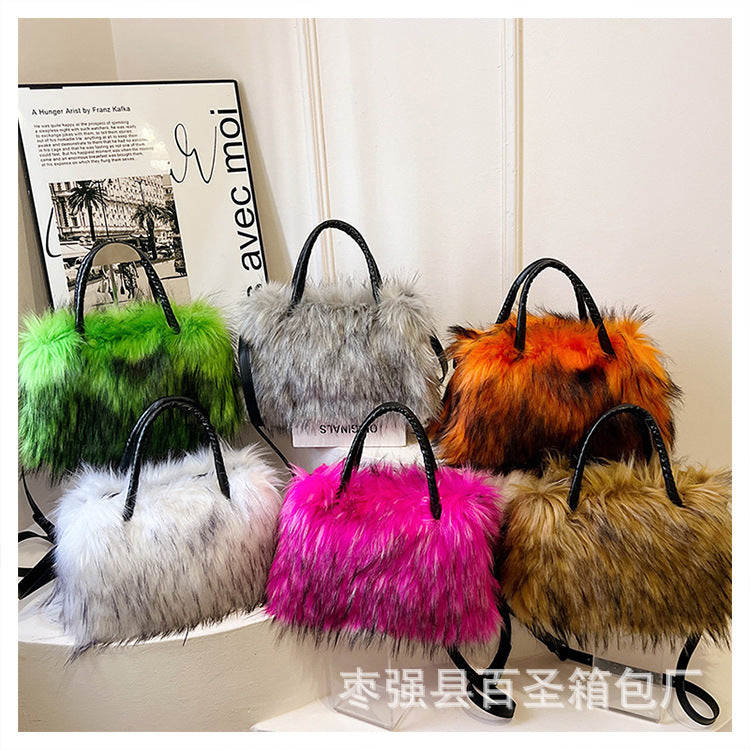 A Plush raccoon fur handbag