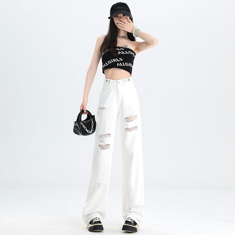 A pair of ripped white jeans