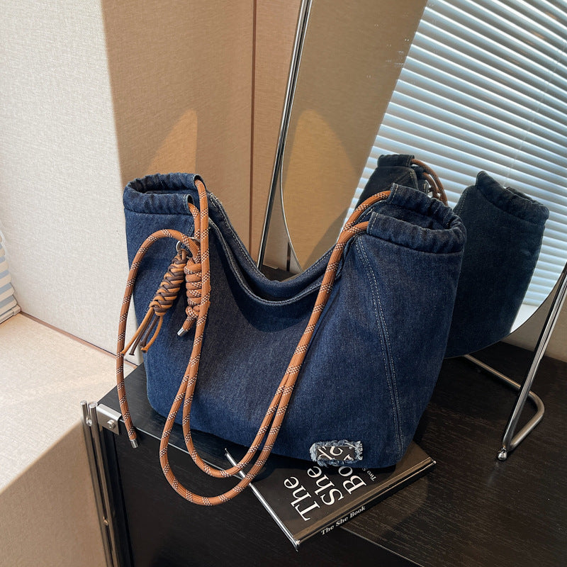 A denim shoulder bag