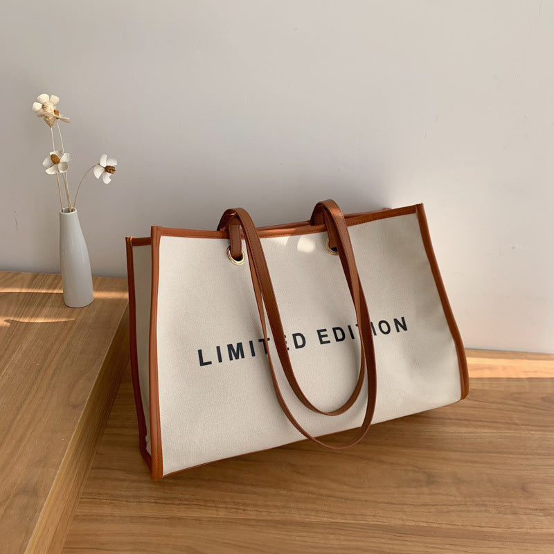 A trendy personalized shoulder bag alphabet printed canvas women's bag