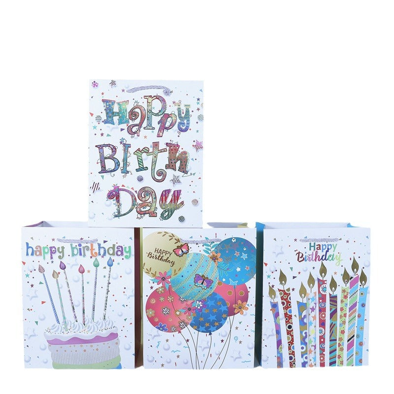 A happy birthday gift paper bag cake wrapping paper bag balloon candle shopping bag spot wholesale plush toy bag