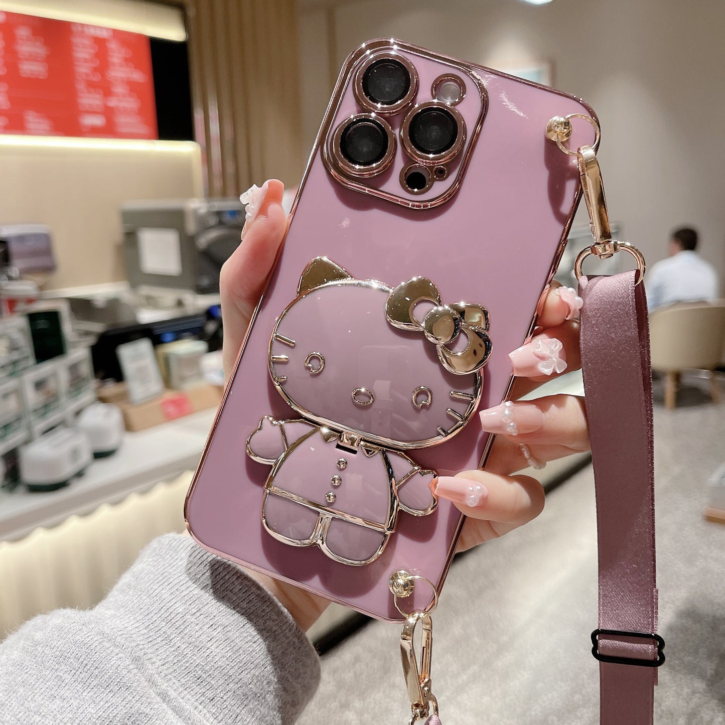 A makeup mirror crossbody rope mobile phone case