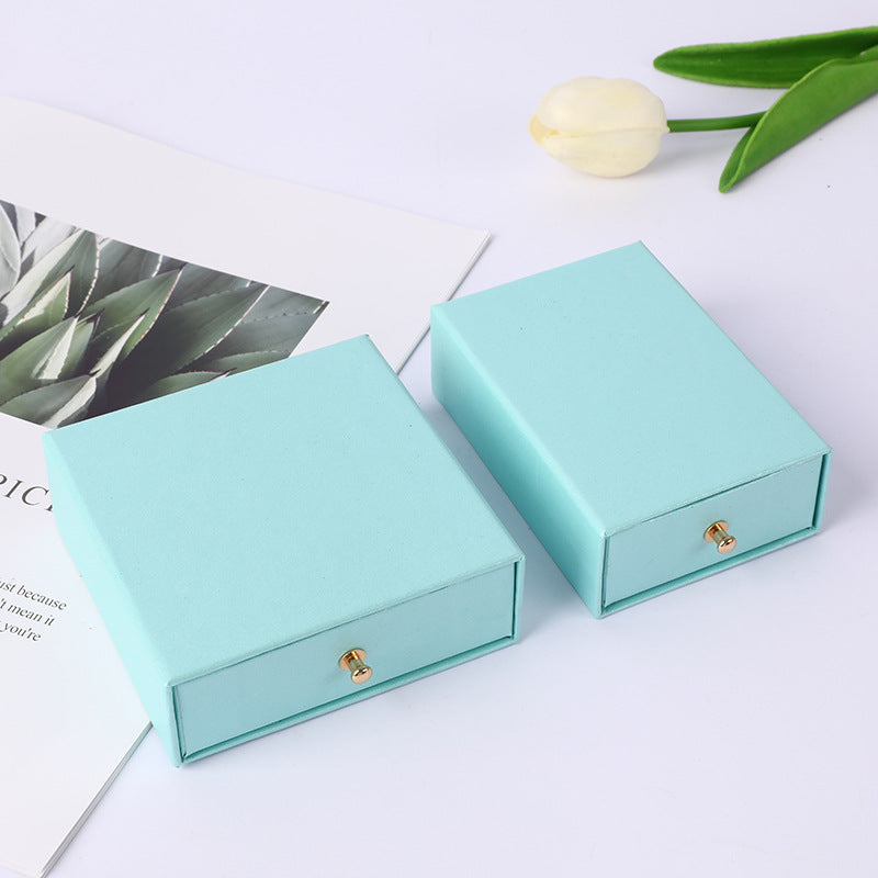 A rivet drawer jewelry box hot gold stamping process