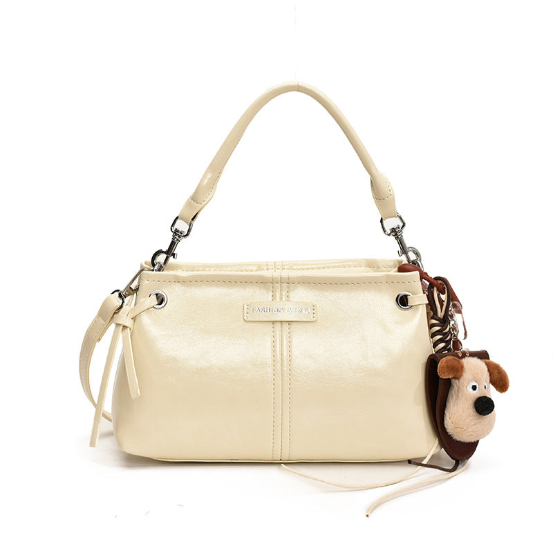 A handbag messenger bag