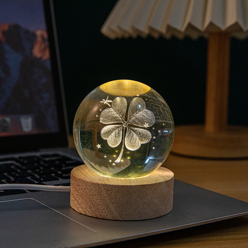 A creative 3d laser engraved crystal ball lamp