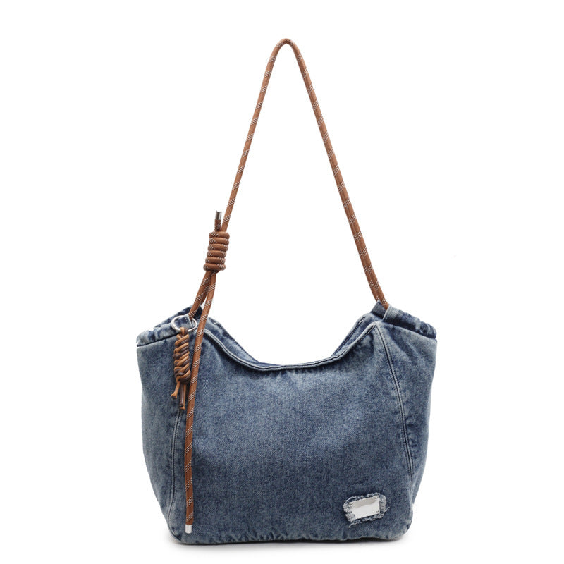 A denim shoulder bag