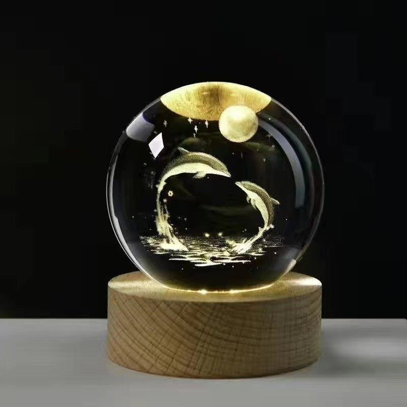 A creative 3d laser engraved crystal ball lamp