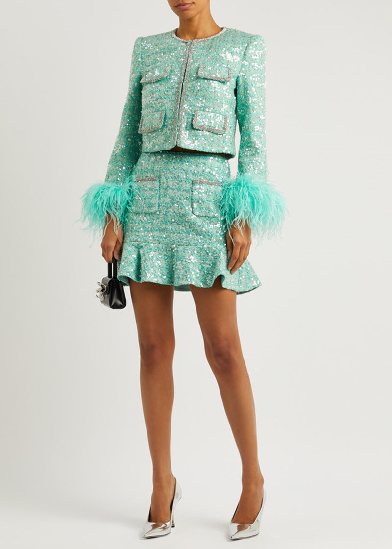 A sequined jacket skirt suit