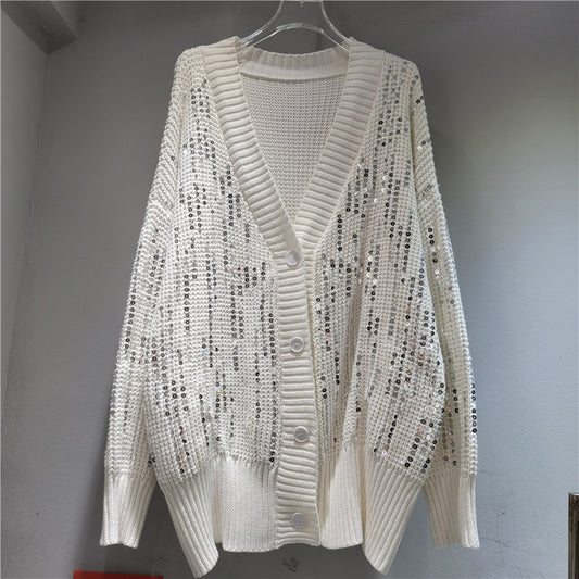 A long-sleeved V-neck sequined knit top