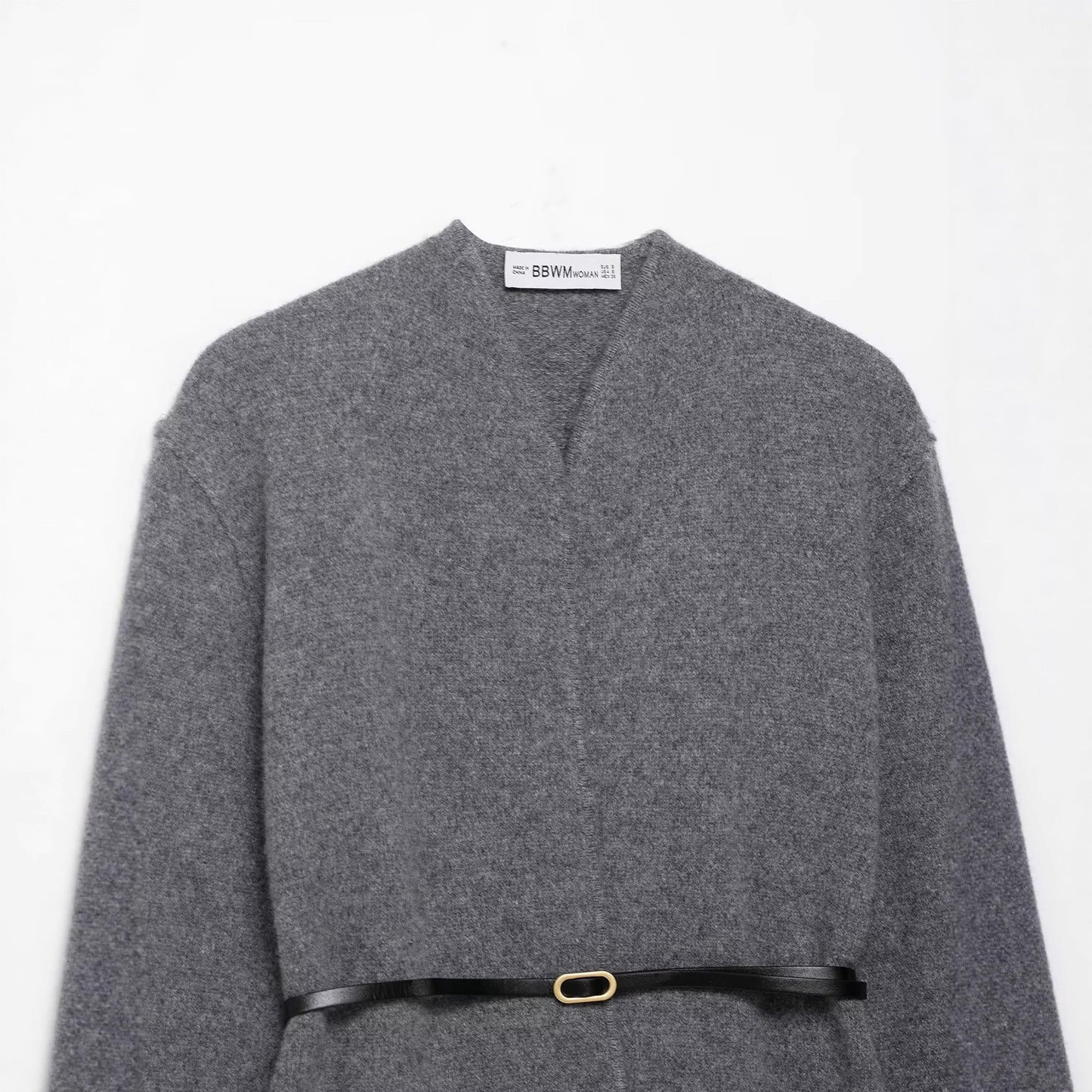 A knitted cardigan sweater jacket