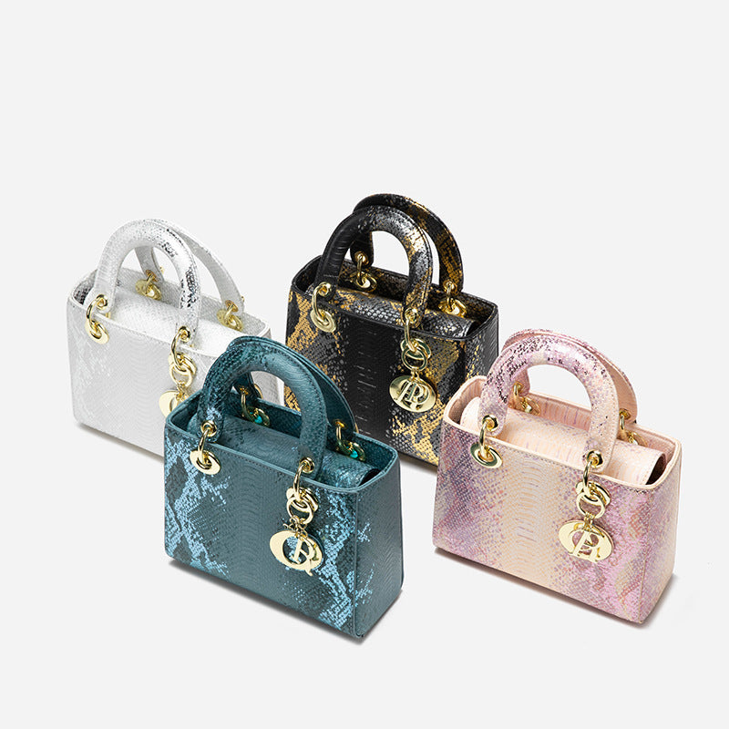 A snake pattern new Princess Diana bag, high-end shoulder messenger bag, high-end fashion pink handbag.