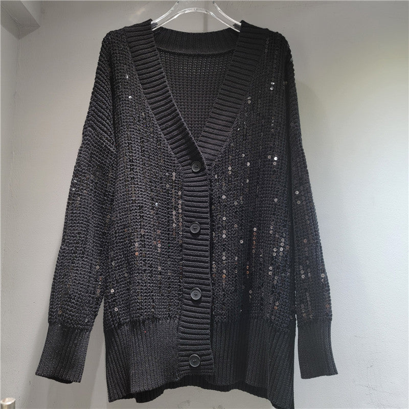 A long-sleeved V-neck sequined knit top