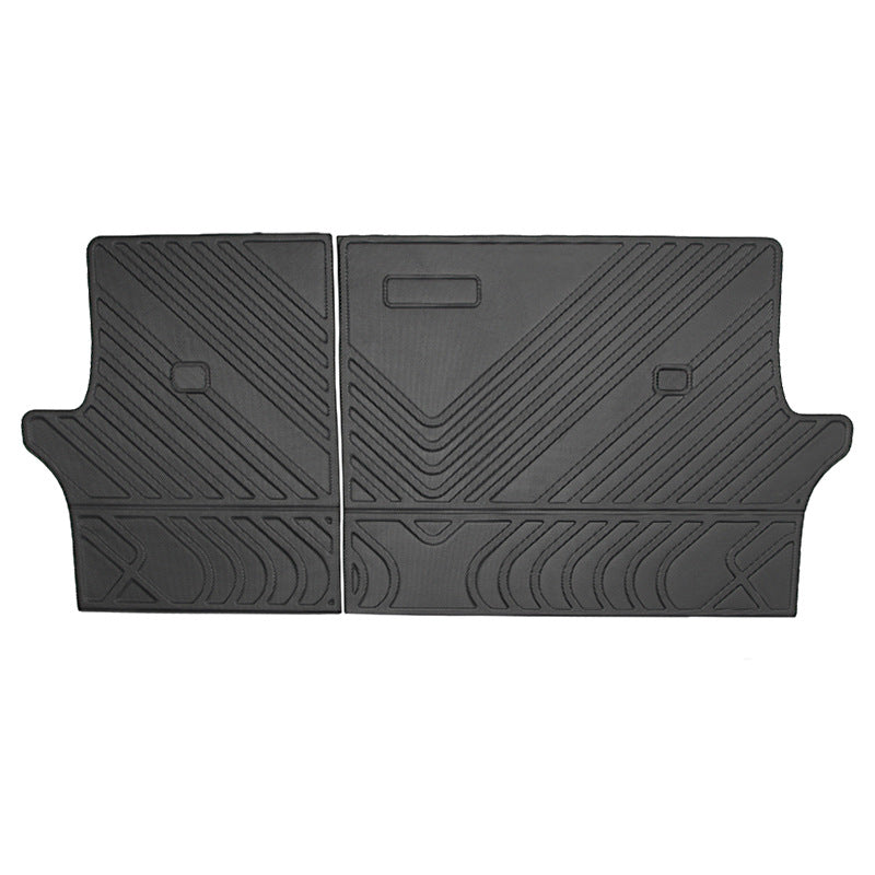 A car trunk floor mat