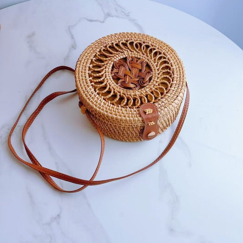 A rattan bag ins diagonal span mini bag Mori basket retro literary woven round bag vacation bucket bag leather buckle bag