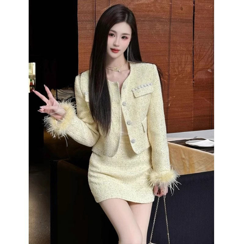 A Spring and Autumn Celebrity Splicing Button Bead Tassel Design Jacket New Fashion Small Fragrant Skirt Two-piece Set