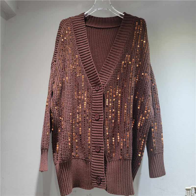 A long-sleeved V-neck sequined knit top