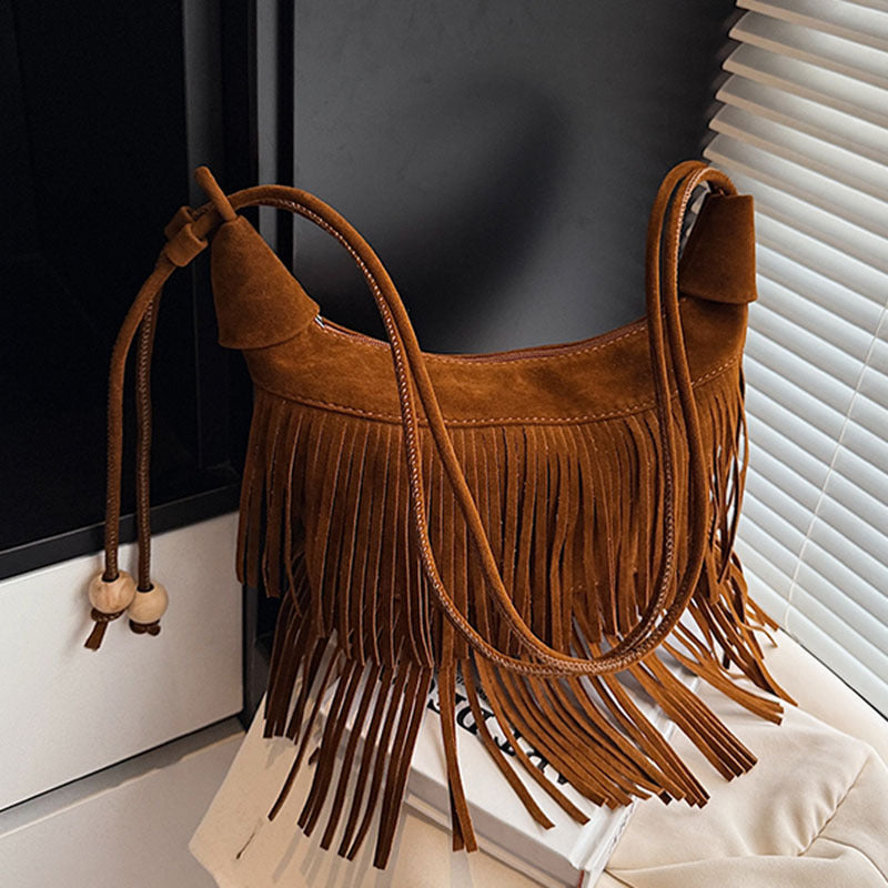 A fringed shoulder bag