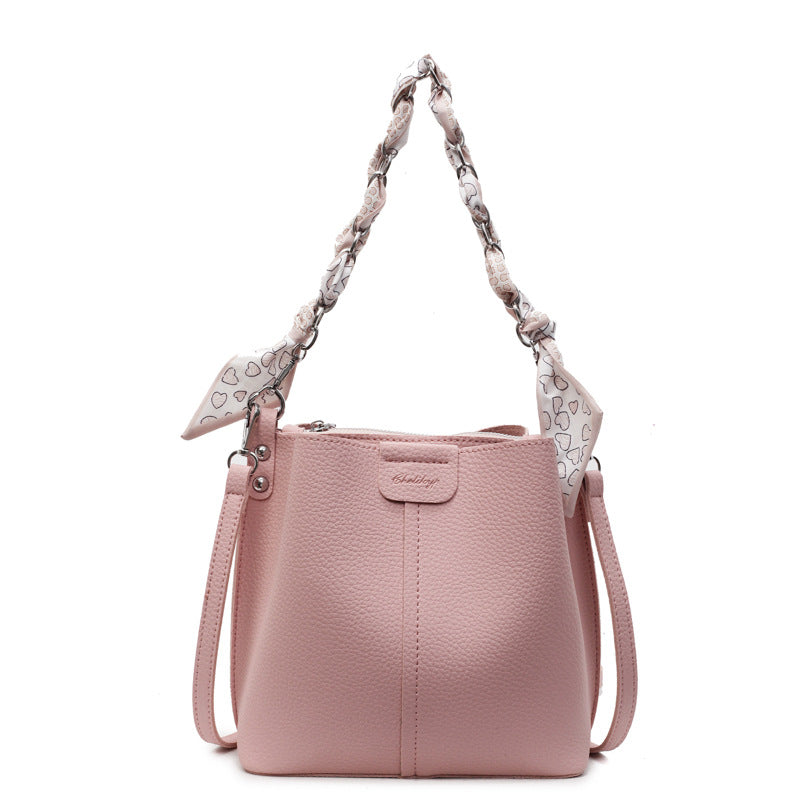 A handbag shoulder messenger bag