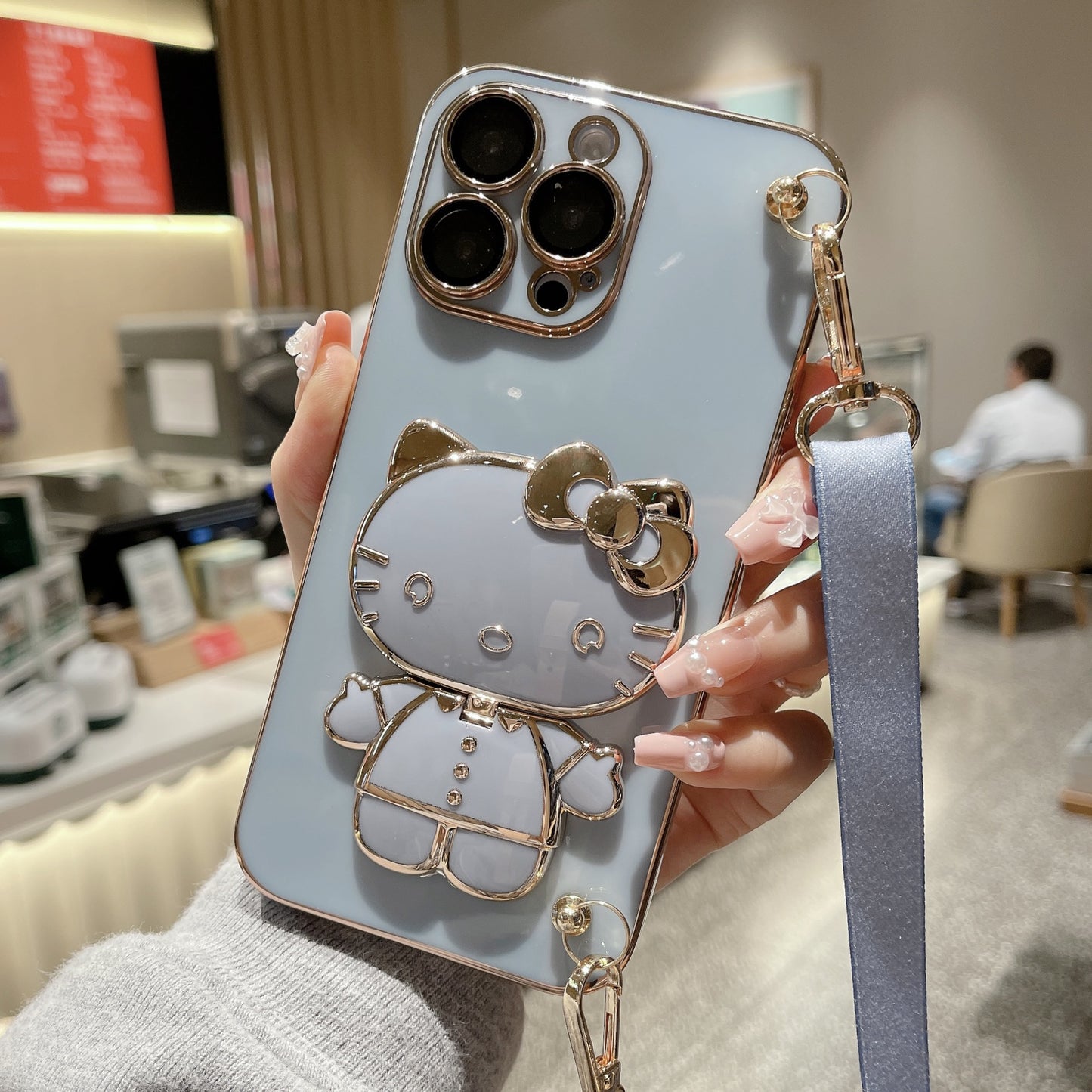 A makeup mirror crossbody rope mobile phone case