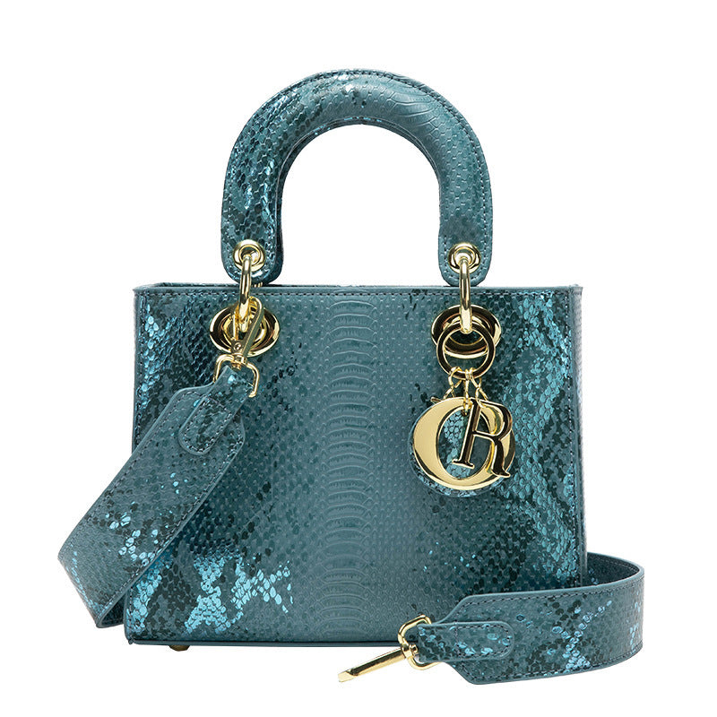 A snake pattern new Princess Diana bag, high-end shoulder messenger bag, high-end fashion pink handbag.