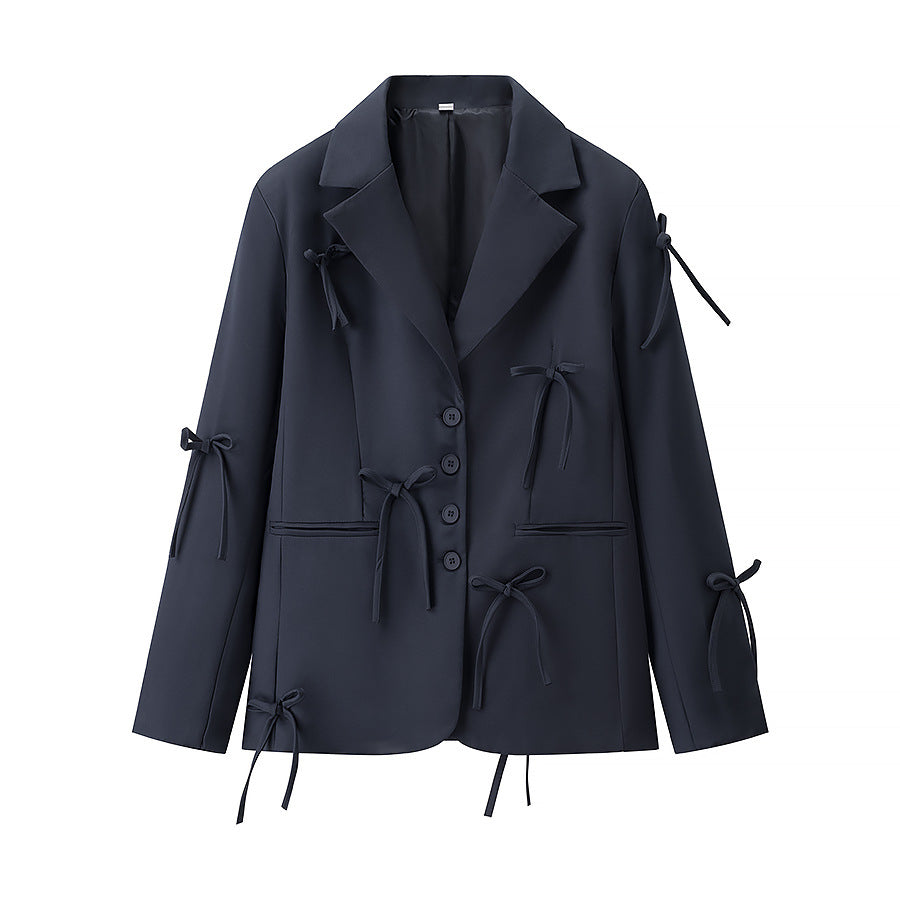 A bow-embellished blazer