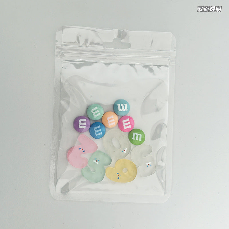 A Macaron color self-sealing bag, holographic bag, thickened transparent color bone bag, jewelry, sealed pocket, makeup brush, packaging bag.