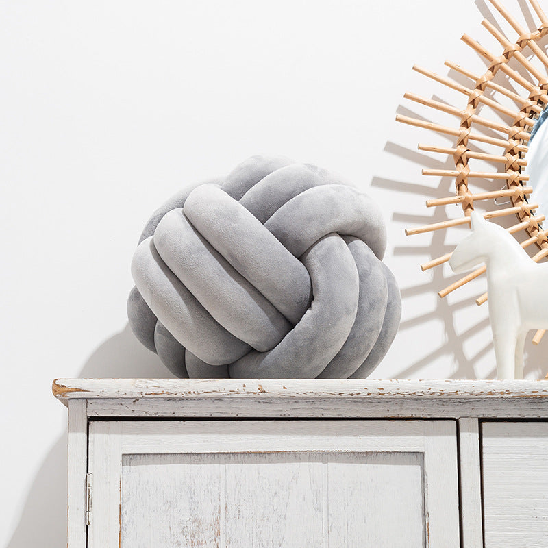 A braided ball pillow